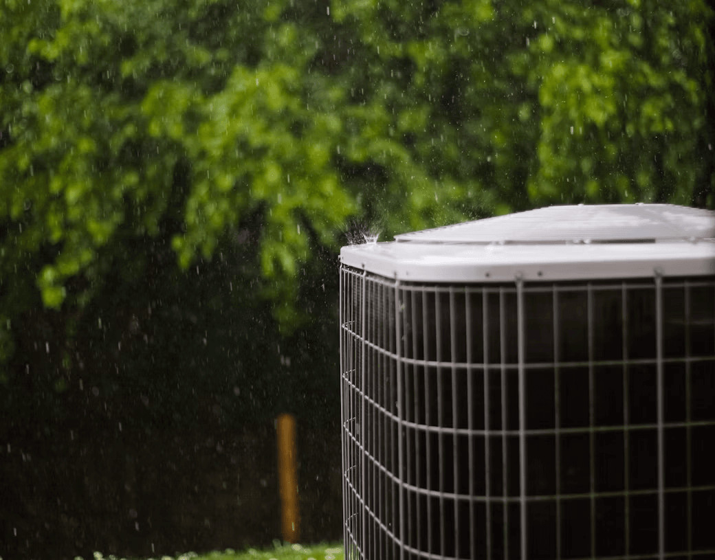 Outdoor air conditioner getting wet in the rain