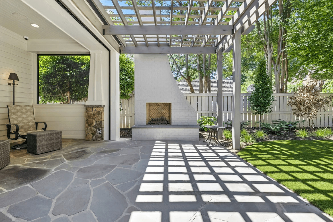 What Customization Options Are Available For Cantilever Patio Covers? 1 Patio with fireplace and seating area under a