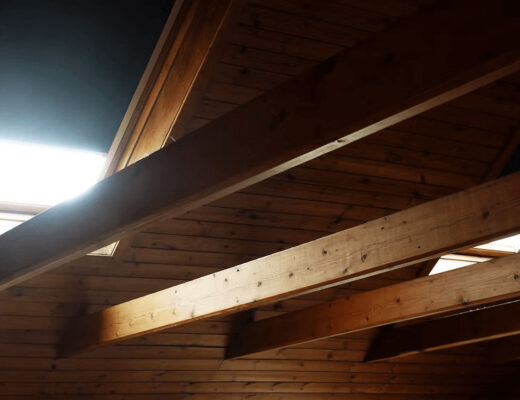 Why Your Home Loses Energy Through the Attic 1 A room with wooden walls and a skylight