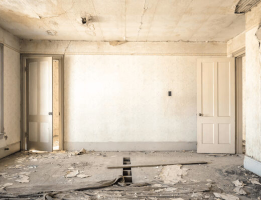 How homeowners are clearing space during major residential renovation projects 2 Empty room with a door and window, cleared for
