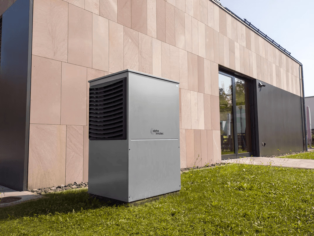 Outdoor silver air conditioner unit for a central heat pump