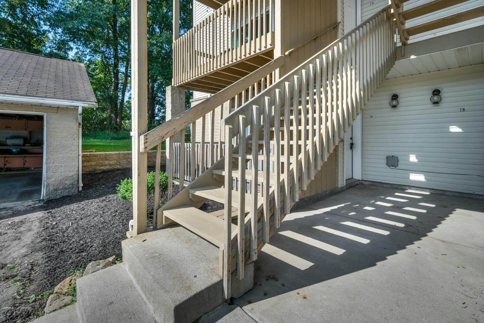 Building a Room Over a Garage: What to Plan Before You Build 2 Staircase and garage, hinting at a room