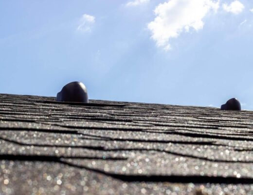 Two round roof vents on a house